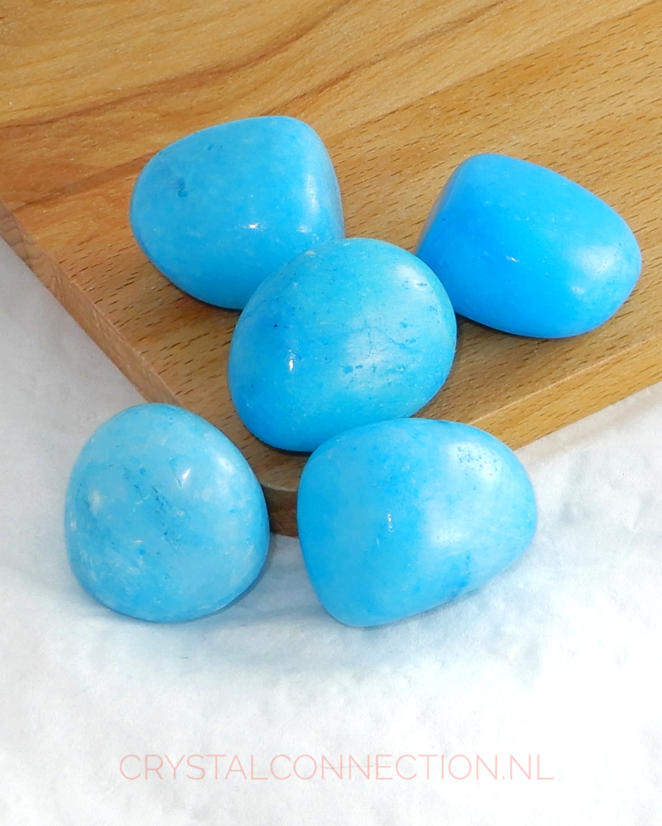 Aragoniet met hemimorfiet trommelsteen