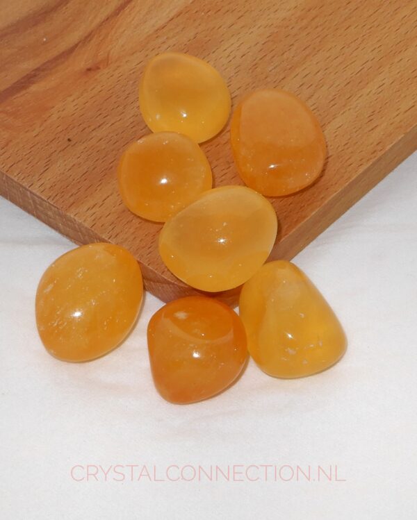 Calciet oranje schijfsteen