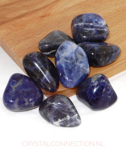 Sodaliet trommelsteen